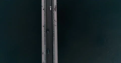 Topdown aerial view of Budapest bridge and traffic during a cloudy day. Stock Footage 237777253