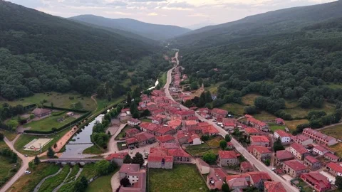 Top‑down drone glide over Salduero village and Duero River, Spain Stock Footage 313794253
