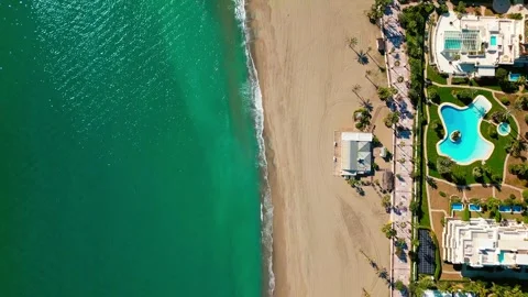 Top‑down drone view of Puerto Banús beach in Marbella, Costa del Sol, Southern Stock Footage 327354187