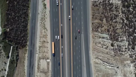 Topdown over bridge shot of Highway 14 near Sierra Hwy offramp Stock Footage 218629375