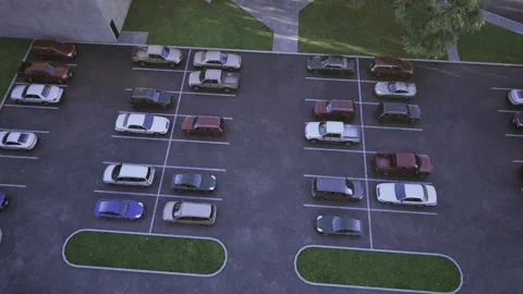 Topdown perspective of dusk urban parking area with landscaping Stock Footage 339622902