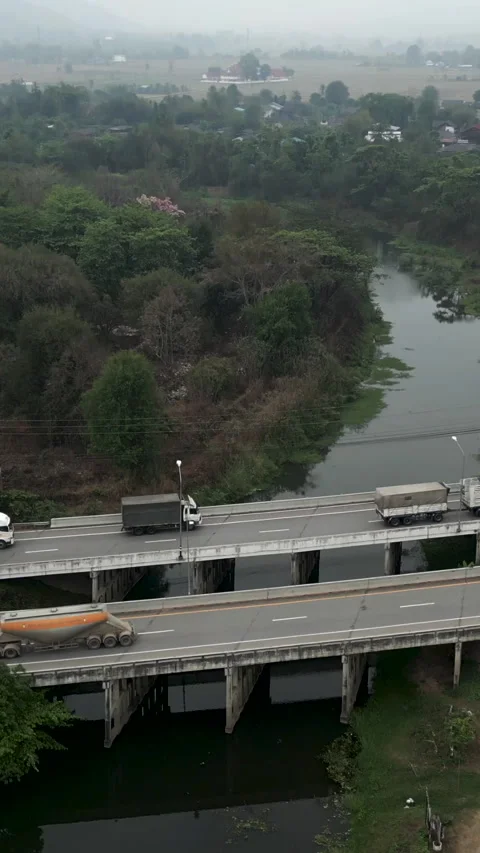 Topdown plan of a road crossing a river Video stock 264759326