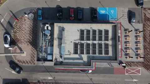 Topdown Rooftop Solar Panel Array Over Mixeduse Block, Monitored For Stock-Footage 335350048