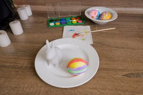 Topdown View Of Bunny And Egg With Colorful Striped Egg, Watercolor Palette 스톡 사진