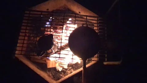 Topdown view of cooking over a campfire Stock Footage 294260639