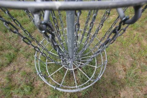 Top‑Down View of Disc Golf Basket on Grass Stock Photos