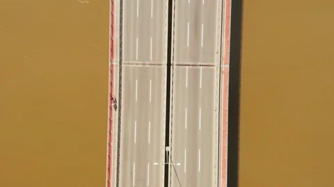 Topdown View of a Long Bridge over a Wintery River Video stock 127264984