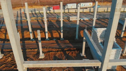 Topdown view of new factory construction building site in rural natural Stock Footage 163225429