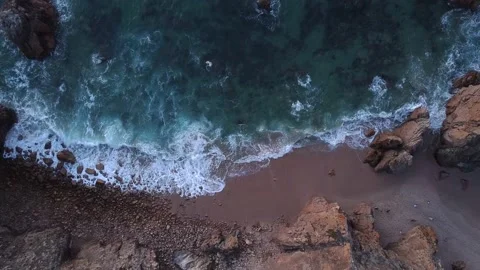 Topdown view of the ocean waves during at Praia de Ursa- Portugal Stockbeeldmateriaal 166574168