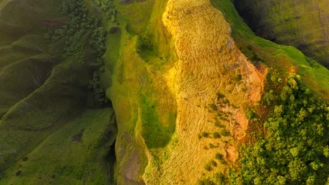 Topdown view over exotic terrain of tropical island under the bright sunset Video stock 122455245