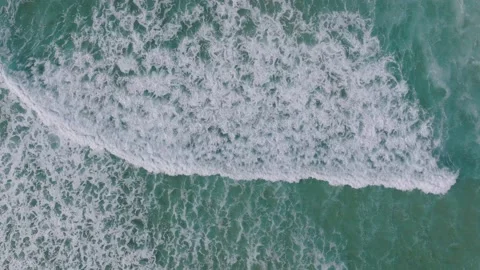 Topdown View Of Rolling Foamy Waves On The Tropical Beach Of Razo. Aerial Shot Stock Footage 237918291