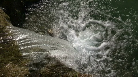 Topdown view of small waterfall splashing into pond (High Definition) Stock Footage 365097