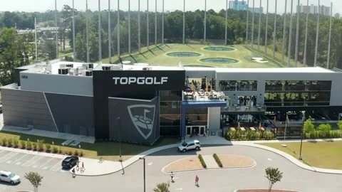 TopGolf Top Golf aerial pullback reveals sports entertainment company. Stock Footage 157793176