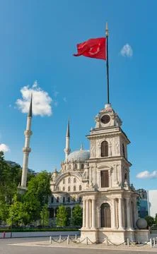 Tophane Clock Tower with Turkish Flag and Nusretiye Mosque, Istanbul, Turkey Stock Photos
