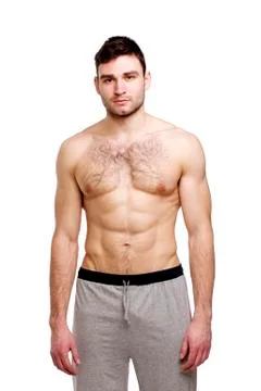 Topless man stood on a white background Stock Photos