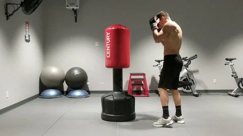 Topless Model on Punch Bag Stock Footage 78614364