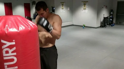 Topless Model on Punch Bag Slow Motion Stock Footage 78616046