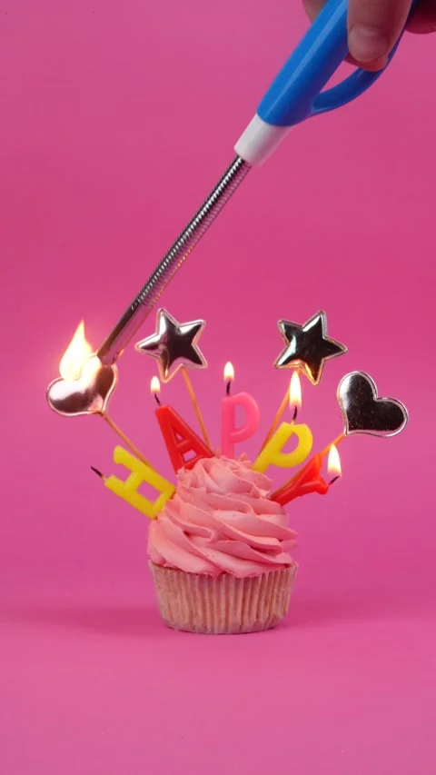 The topper on the cupcake caught fire.fire on the cupcake with the inscription Stock Footage 275349591