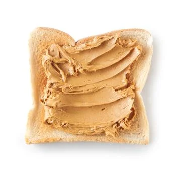 Topping of smooth peanut butter Stock Photos