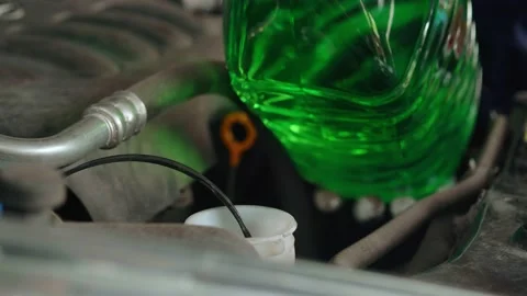 Topping up washer fluid in the car Stock Footage 158507786