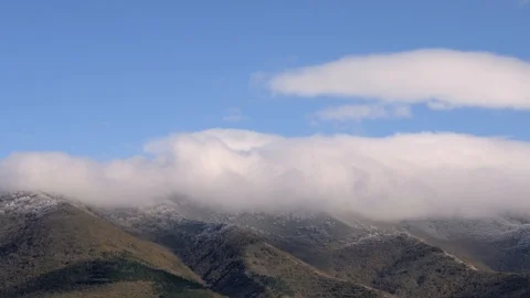 Tops of mountains in low thick clouds and trees covered with hoarfrost, morning Stock Footage 98494290