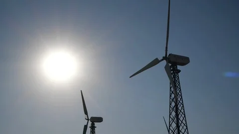Tops of windmills in the sun Stock Footage 94880790