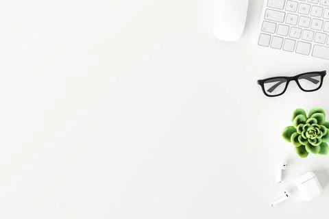 Topview of desktop white desk,working space,working background. Stock Photos