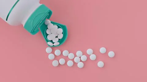 Topview of melatonin tablets flying from the jar. dietary supplement Stock Photos
