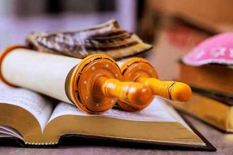 Torah Scrolls religious texts displayed on table, with shofar Jewish festival Stock Photos