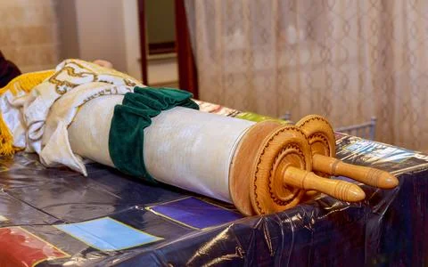 Torah is on a table in synagogue and is ready to be read on Shabbat Stock Photos