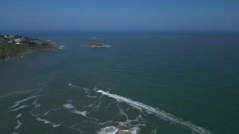 Torbay, Devon, England: DRONE VIEWS: Speedboat intersects Shag and Thatcher Rock Stock Footage 242799789