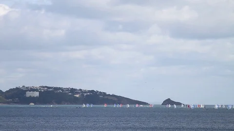 Torbay, Devon: Yachts sailing off Thatcher Rock and Torquay (NO AUDIO) Stock Footage 115572704