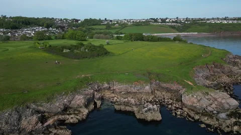 Torbay, S. Devon, England: DRONE AERIAL VIEWS: Broadsands coastal headland Stock Footage 241446185