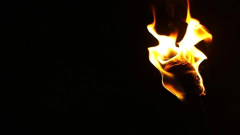 Torch burns at night Stock Footage 88784771