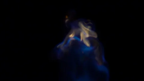 Torch flame.  Blue to yellow flames billow swirl and flickers away. Stock Footage 96429405