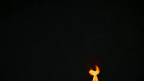 The torch flares up slow motion Stock Footage 79435945