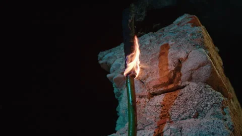 Torch hanging on the wall in the night Stock Footage 292031555