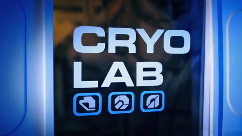 Torch Lights Up Cryo Lab, Looking Around Hi-Tech Facility Stock Footage 299641958