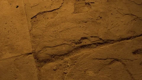 Torch rolling across stone ground Stock Footage 133360524