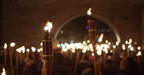 Torchlight procession at night people walk and protest with burning torches Stock Footage 127089061