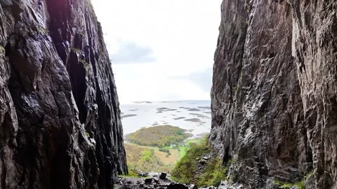 Torghatten: Mountain with hole fly through in Norway Drone 4K flying trough Stock Footage 287207224