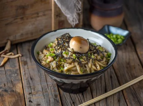 Tori UDON served in a bowl isolated on wooden background side view of japanes Stock Photos
