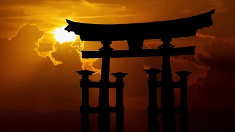 Torii Gate at Miyajima in Hiroshima, Time Lapse at Sunset with Red Sun and .. Stock Footage 276623411