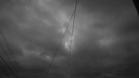 Torm rain clouds. dark sky with heavy clouds black and white Stock Footage 304316256