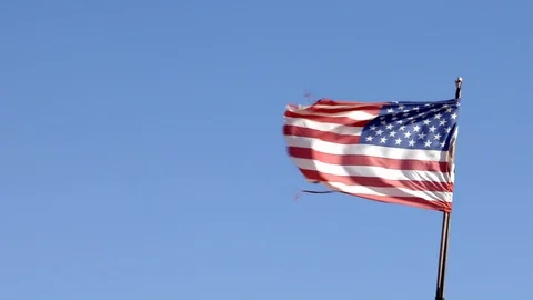 Torn American Flag in Wind Closeup Slow Motion Video stock 126887225