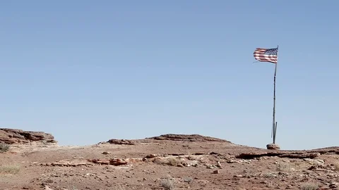 Torn American Flag in Windy Desert Wide Slow Motion Video stock 126887384