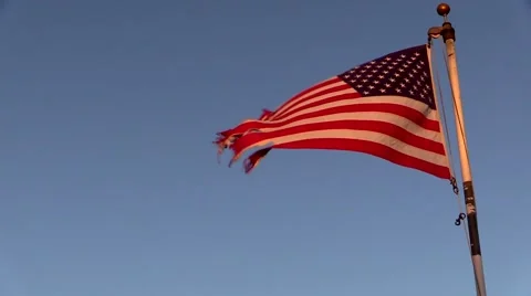 Torn and tattered US flag that needs to be replaced Stock Footage 52706214