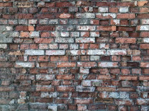 Torn brickwork for background. Stock Photos