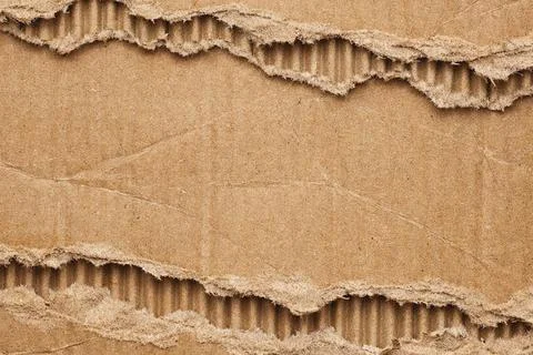 Torn brown cardboard texture background closeup. Stock Illustration