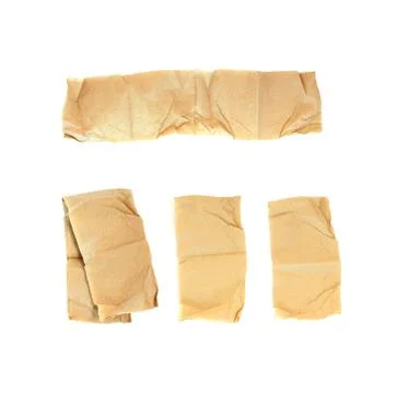 Torn brown tissue paper on white background Stock Photos